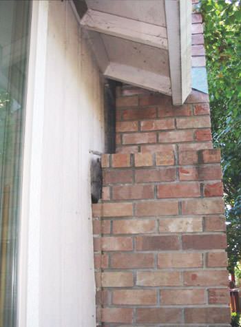 sinking, leaning chimneys that are in danger of collapse in Maxton