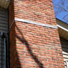 A tilting chimney on a La Grange home with a leaning, tilting chimney that was temporarily repaired.