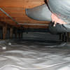 A sealed crawl space with an insulated hot air duct in Greenville.