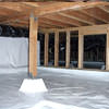 A large, encapsulated crawl space with our vapor barrier system installed in Sanford.
