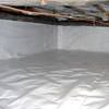 A crawl space vapor barrier has been installed on the walls and floors of this space in Camp Lejeune.