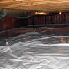 A sealed crawl space with support posts showing in Jacksonville.