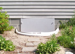 Rigid plastic crawl space access well installed in a Greenville crawl space