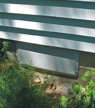 A gray crawl space vent cover in Hampstead