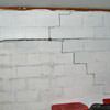 A buckling foundation wall in a Southern Pines home.