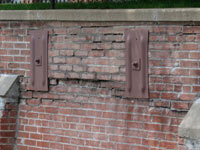 A collapsing, crumbling retaining wall in La Grange
