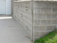A retaining wall separating from the adjoining walls in Red Springs