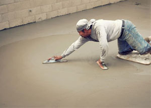 smoothing out the grout in a slab releveling project in Sanford