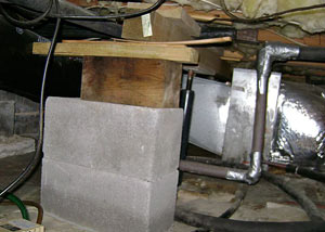a poorly designed crawl space support system installed in a Leland home