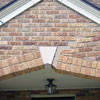Major tuckpointing on a home archway over a door, with tuckpointing several inches wide that has failed on a Fayetteville home
