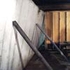 Temporary foundation wall supports stabilizing a Goldsboro home