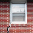 foundation cracks along a window in New Bern