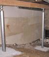 A system of crawl space support posts adding structural support to a crawl space in Rocky Point