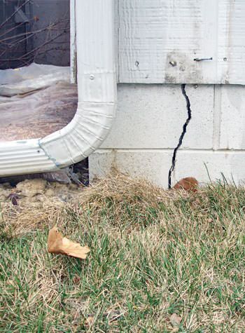 foundation wall cracks due to street creep in Dudley