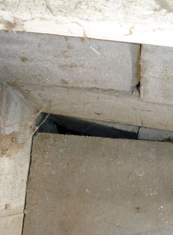 inward rotation of a foundation wall damaged by street creep in a garage in Saint Pauls