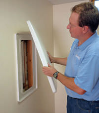 wall anchor covers installed in a foundation repair for a Laurinburg home.