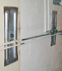 A foundation wall anchor system used to repair a basement wall in Southern Pines