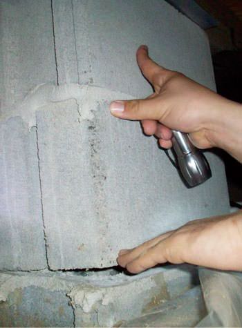 a completely failing concrete crawl space support pillar in Rocky Point