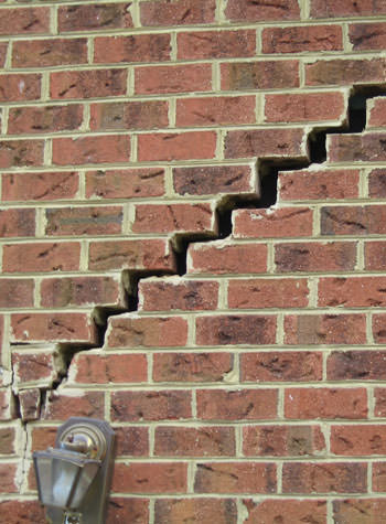 major cracking of a brick foundation wall in Hubert