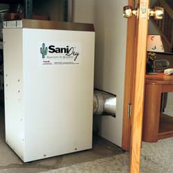 A basement dehumidifier rating ducting dry air into a finished area of the basement  in Rocky Point