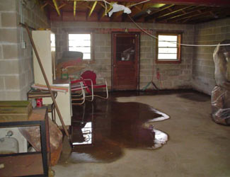 a flooded basement floor in a Rocky Point home