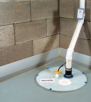 A baseboard basement drain pipe system installed in Kinston