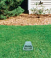 A buried gutter drain downspout extension installed in a Rocky Point home