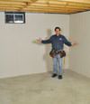 Sanford basement insulation covered by EverLast™ wall paneling, with SilverGlo™ insulation underneath